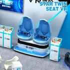 Simulatore bianco blu di realtà virtuale del cinema della cabina di giro dei sedili 9D VR di colore due per il parco di divertimenti dei bambini